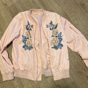 Pink bomber jacket with flowers